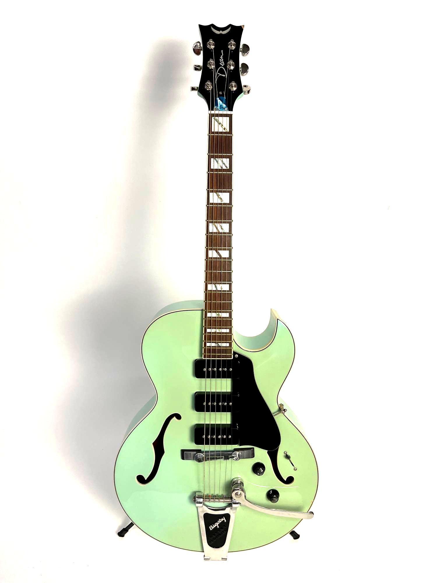 Dean Palomino Surf Green 6-String Hollow Electric Guitar: Dean Palomino Surf Green with Bigsby 6-String Hollow Electric Guitar #D-169,120 and comes with a Topp Pro Music Gear soft case. It has chrome high finish ribbon wound strings, 20 frets with rectangula