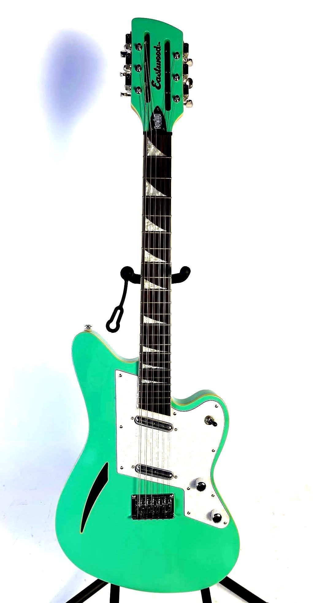 Eastwood Surfcaster Semi-Hollow Seafoam Green 12-String Electric Guitar: Eastwood Surfcaster Semi-Hollow Seafoam Green 12-String Electric Guitar #1501637, made in Korea, and comes with an Eastwood Guitars hardshell case. It is made with bound tone chambered mahogany with a