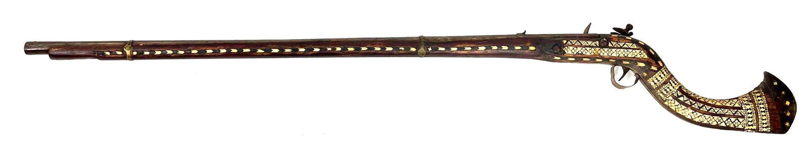 Antique 1816 Bone and Ebony Inlay Syrian Flintlock Musket: Antique 1816 Bone and Ebony Inlay Syrian .69 caliber flinklock musket made with a wooden and metal body. The base has an intricate pattern mixing the bone and wood. It appears to have held a sort of b