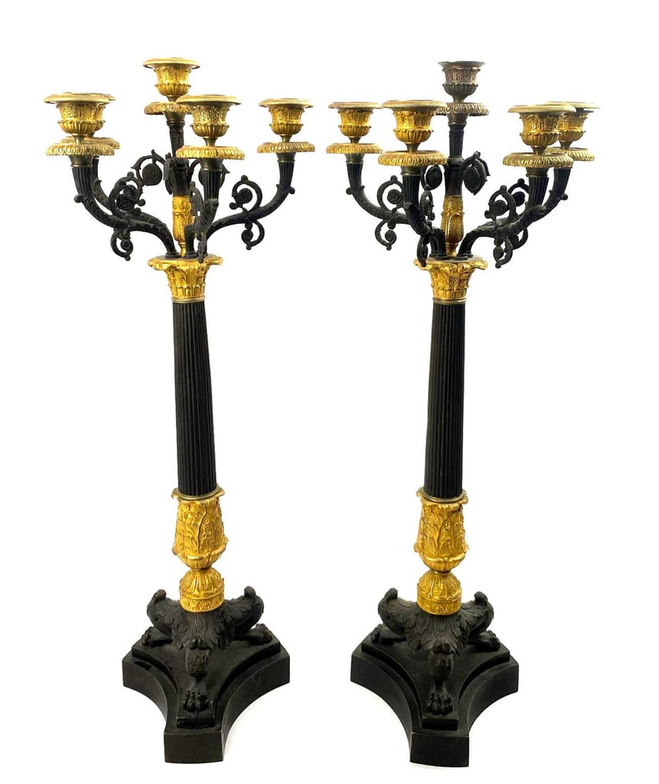 Pair of 19th Century French Empire Bronze and Metal Candelabras: 19th Century French Empire, Napoleonic bronze and metal candelabras. 28.75 inches tall. 1 candelabra has an insert piece missing as well as one of the florets broken.