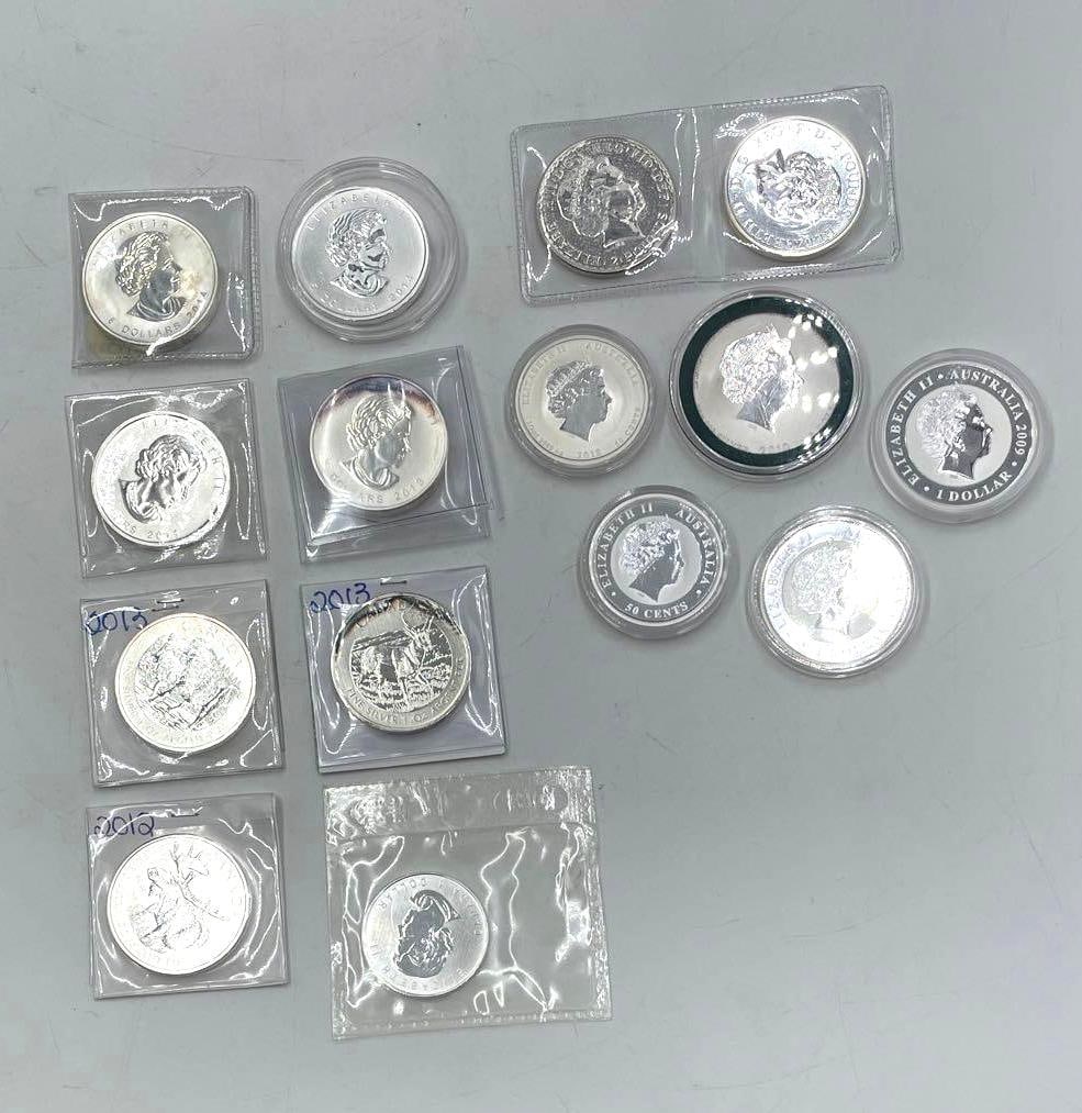 English and Australian and Canadian Silver Bullion: English and Australian and Canadian Silver Bullion. 15 Pieces, mostly one ounce pieces. Three 1/2 ounce and two 1 1/2 ounce pieces.
