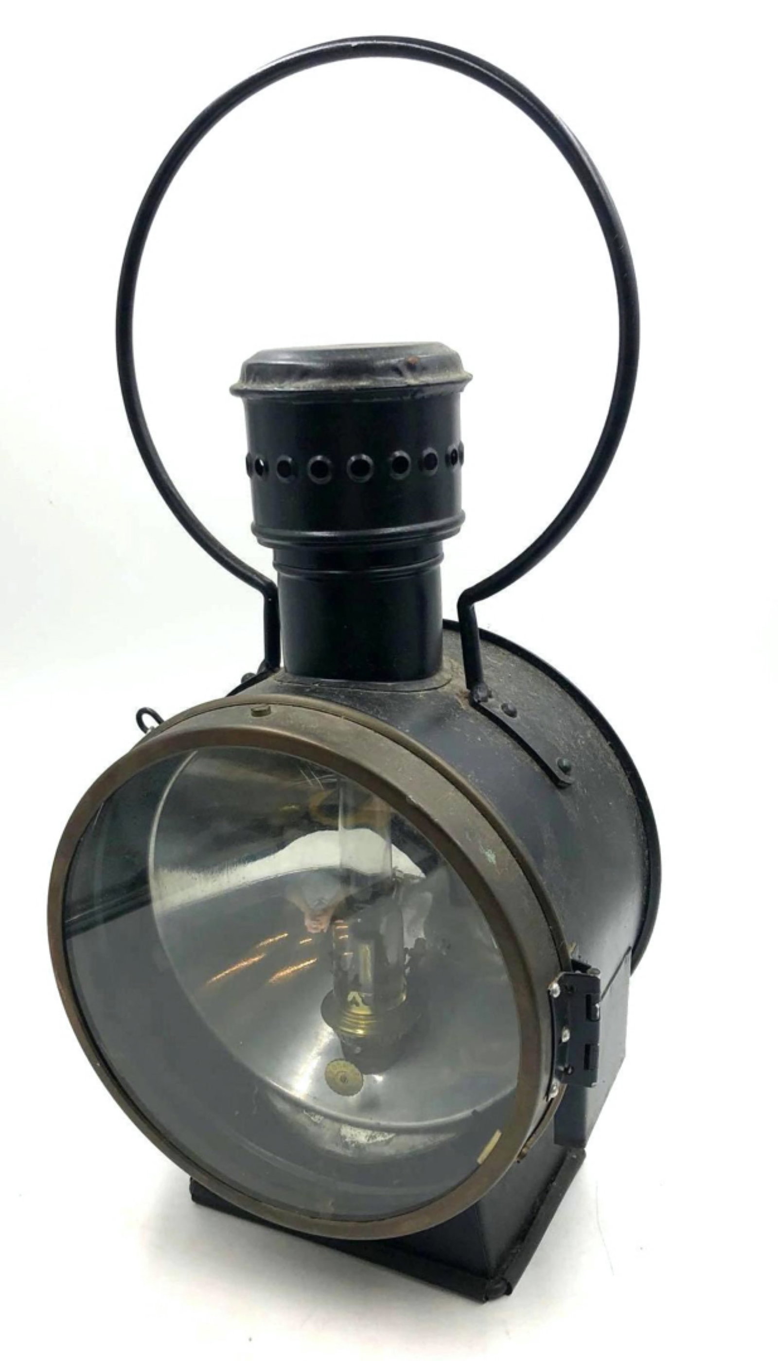 UNGER Train Engine Headlight Lantern: An UNGER Steam Train Engine Headlight Lantern with the rare Kosmos Brenner Kerosene Burner, and Locking pin on the side. The piece maintains the two hooks on the back that secured it to a train. 21in 