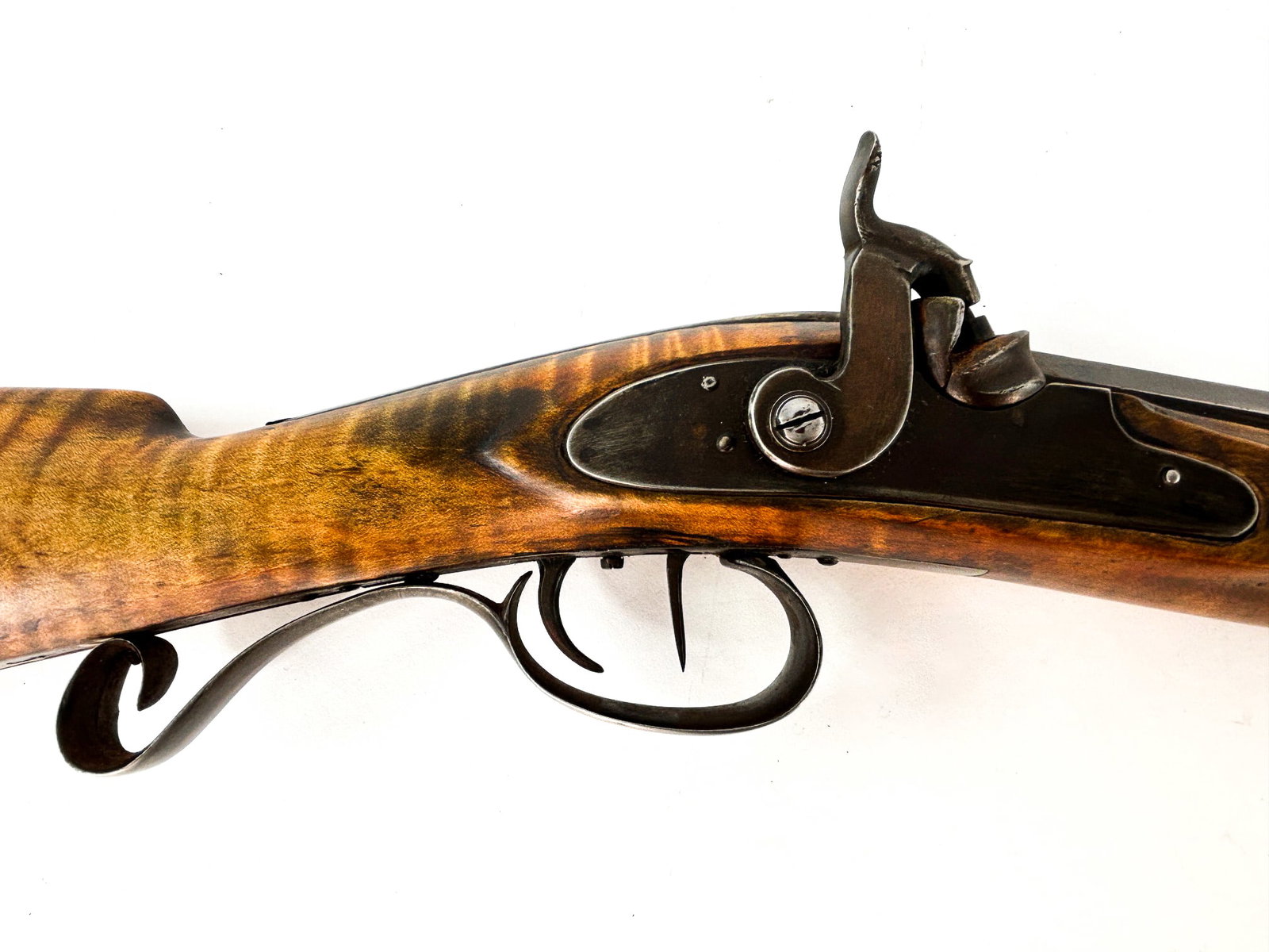 Reproduction Missouri River Hawken Rifle: Reproduction Missouri River Hawken Muzzleloading percussion rifle. Maple stock. The ramrod is intact. Stamped "St. Louis". Measures 47.25in x 1.25 in x 4in. The barrel is 32 inches.