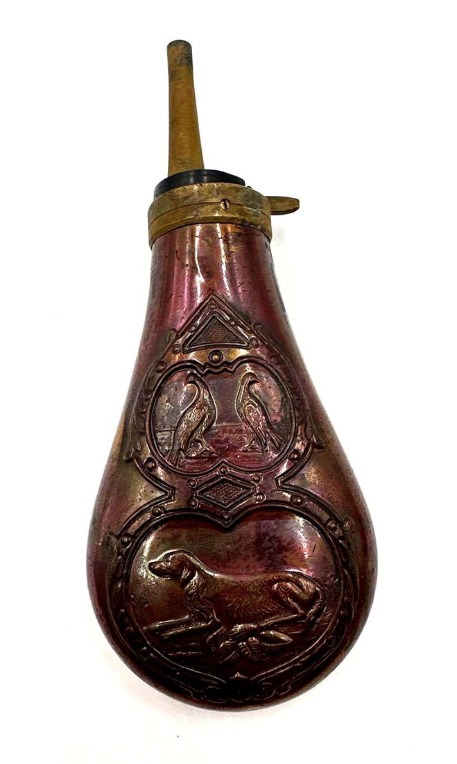 Flask: The flask features animal reliefs around the body. Measures 2.75x1.5 x6.75 in.