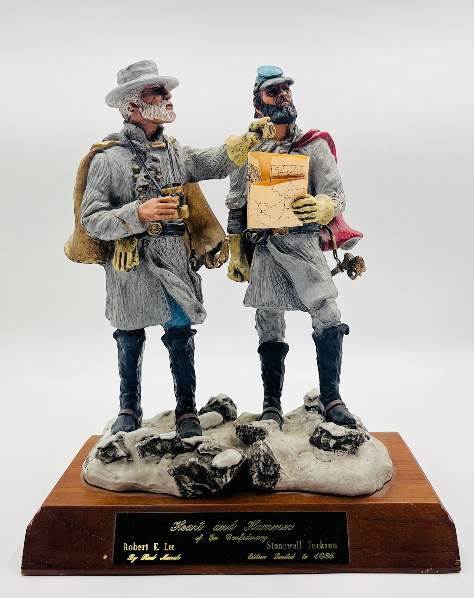 Heart and Hammer of the Confederacy: signed civil war sculpture by Rod Mench featuring Stonewall Jackson and Robert E. Lee. Both dressed in Confederacy uniform and capes the men stand on rocky ground while Jackson holds a map of Virginia