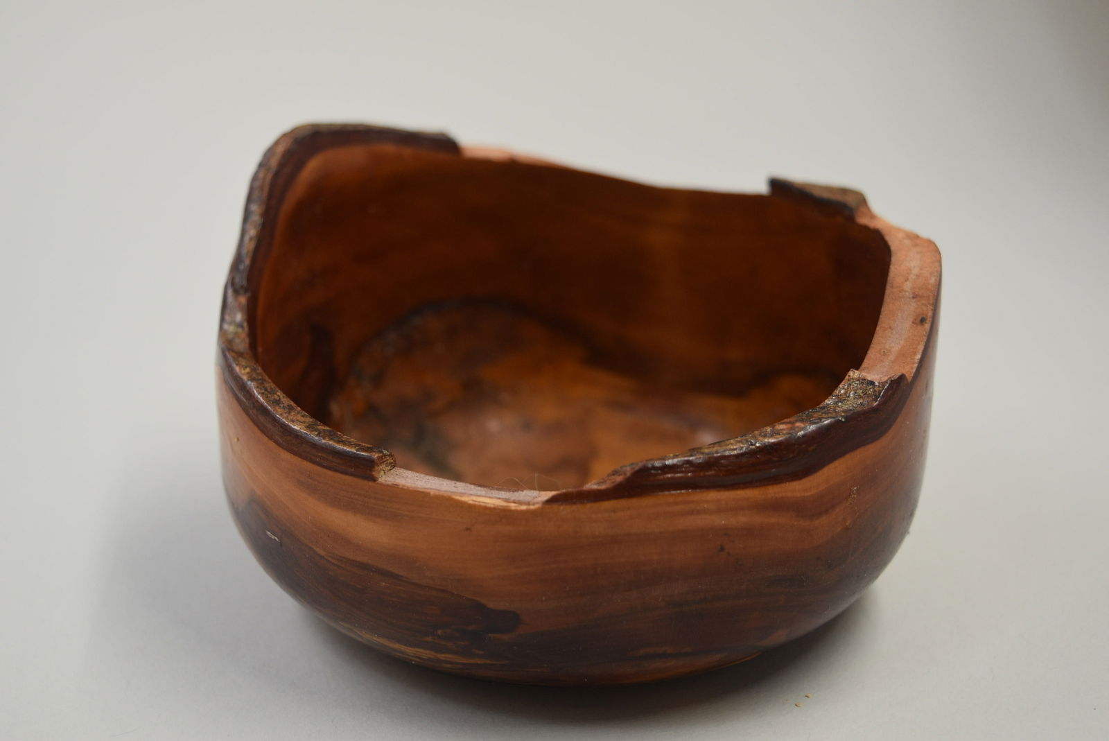 Fred Wilson Loquat Wood Bowl: Artist: Frew Wilson Title: Loquat Wooden Bowl Origin: American Medium: Loquat Wood Dimensions: 4x3in Additional information: a wooden carved bowl made out of loquat wood. The edges are created with an
