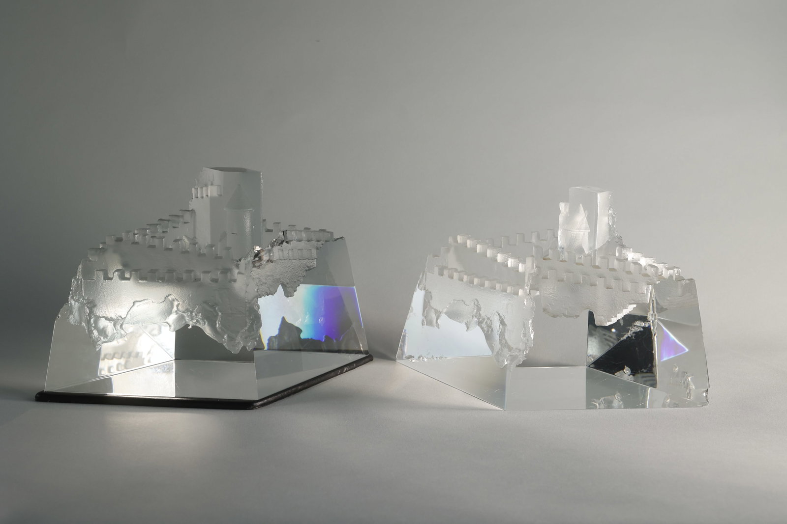 Two believed to be Steuben Castle of Dreams Crystal Sculptures: Two sculptures of what is believed to be Steuben's Castle of Dreams. The piece is created with perfectly cut angles and balanced with the raw crystal giving a balance between geometric and organic. Th