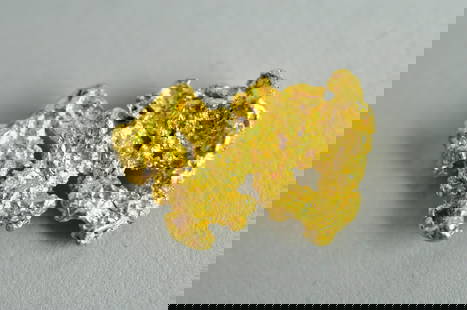 Australian Gold Nugget: Genuine Australian high purity Gold Nugget that weighs 3.91 grams. Beautiful and unique piece that is slightly smaller than a quarter.