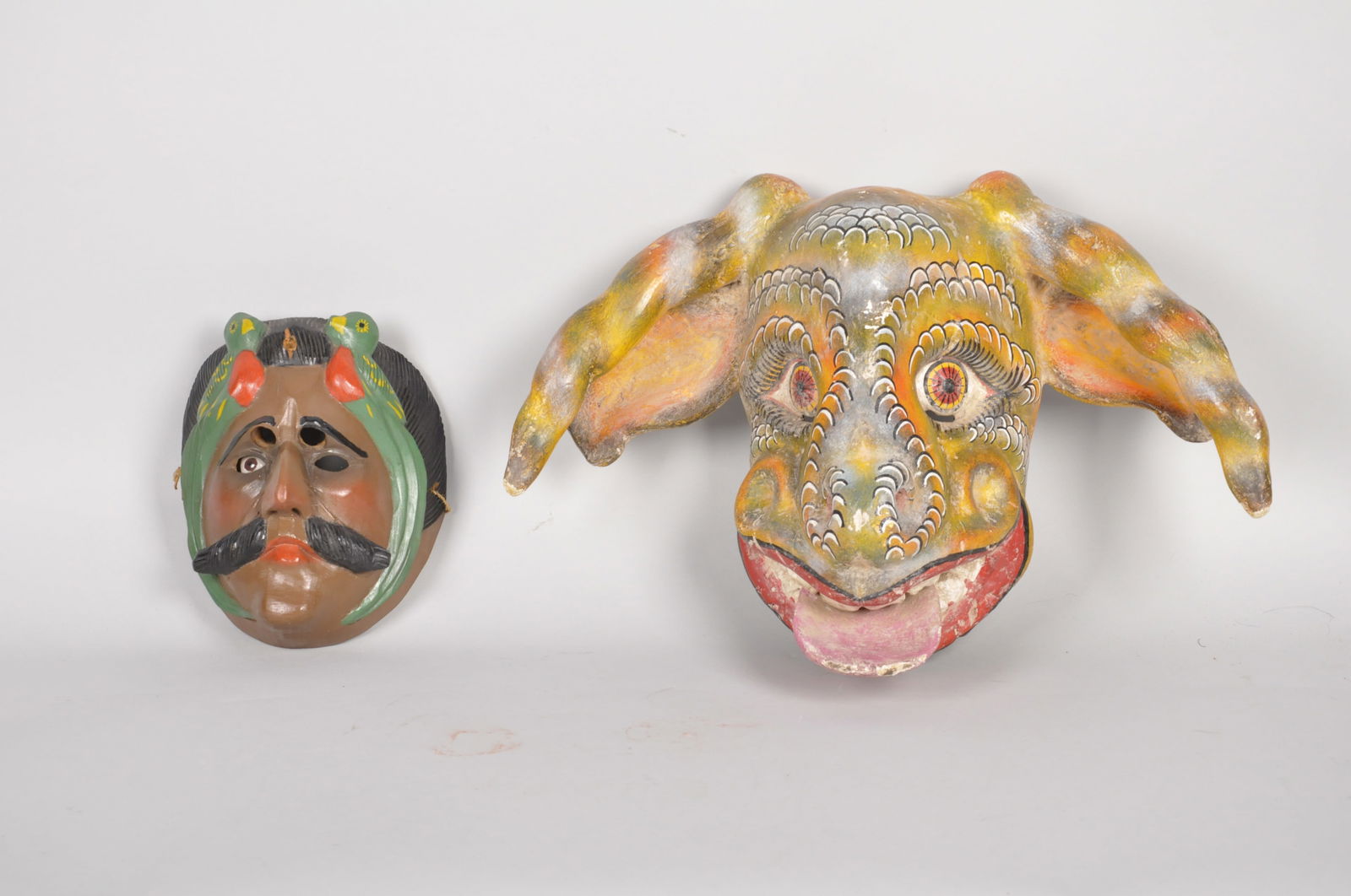 Conquista Teco Uman Dance Mask and Mythical Creature: Origin: Guatemala Medium: Mixed Media Dimensions: Conquista Teco Uman Mask- 7x9x5in <