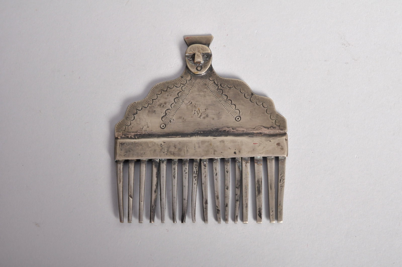 Handcrafted Mapuche Horse Mane Comb: Origin: Mapuche, Chile Dimensions: 3.75x0.125x4.25 in. Condition: Ta