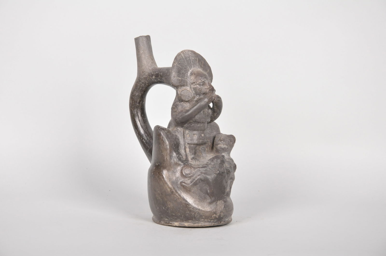 A Black Moche Stirrup Spout Multi-Figural Bottle (1 of 6)