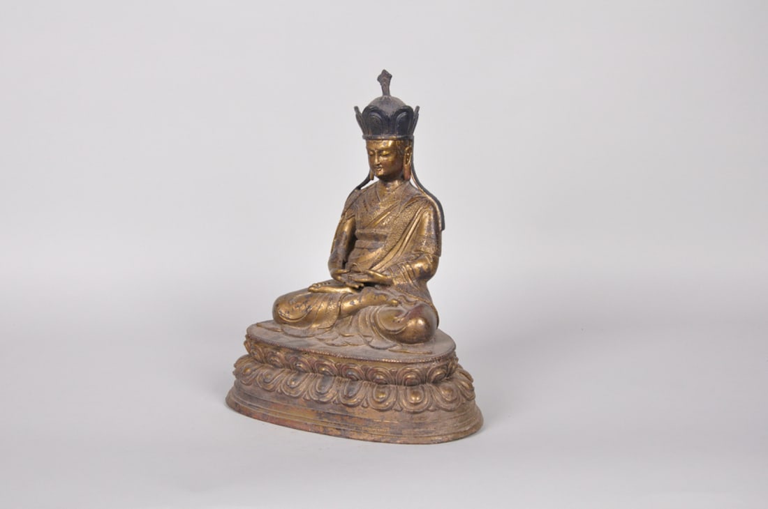 Bronze Seated Ksitigarbha Bodhisattva: Origin: Tibet, China, Early 20th Century Medium: Bronze Dimension: 10x8x5.5in
