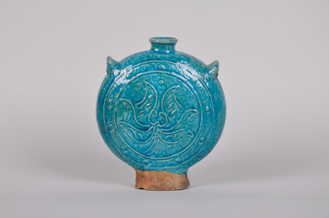Chinese Ming Dynasty Turquoise and Orche Glazed Moon Flask: Origin: China, Ming Dynasty Medium: Ceramic Dimension: 6.5x2.25x8 in.