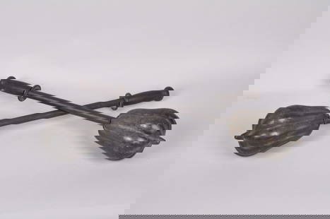 Pair of Chinese Club Maces, 1900's: Origin: China, Late 19th century Medium: Brass and Wood Dimension: 5 diameter x 22.5in Condition: Ware and some scratches in the brass and wood handle Description: A pair of early 1900