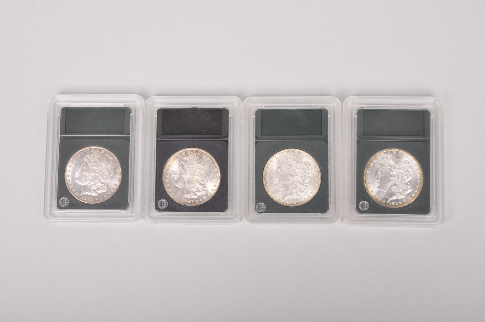 Ungraded Slabbed Morgan Silver Dollars (1 of 11)
