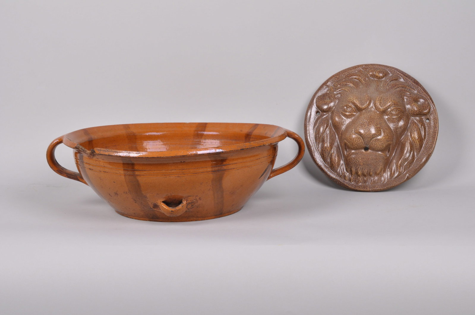 Clay Lion Decor Face and Terracotta 19th Century French Bowl: Manufacturer: The Lion Face is made by Errington Reay and Co. LTD