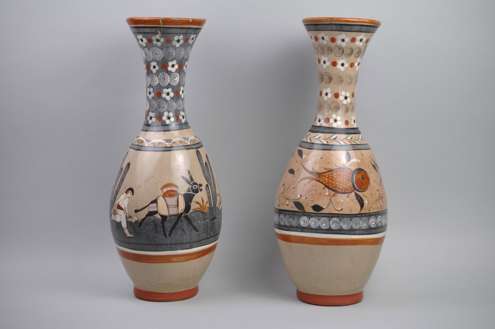 Tonala Hand Painted Mexican Pottery Vases: Dimensions:?Approx. 1/2x4x17 1/2" Condition:?Both Vases Have Large Repaired Chips Around Top Lips Additional Information: