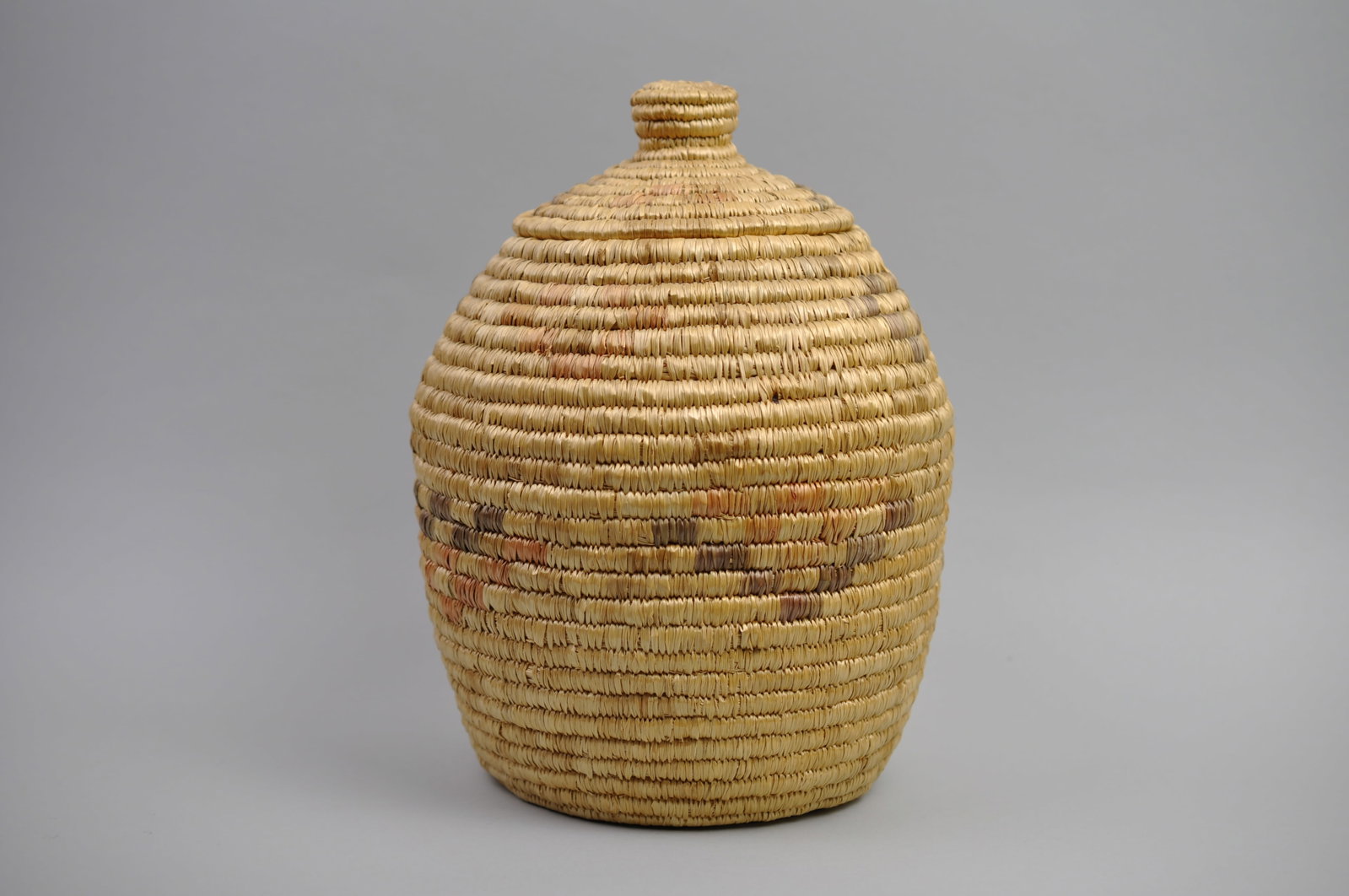 Native American Basket w/ Lid: Dimensions:?Approx. 12x9" Condition:?Colors to the Outside have some Fading Additional Information:?This beautif