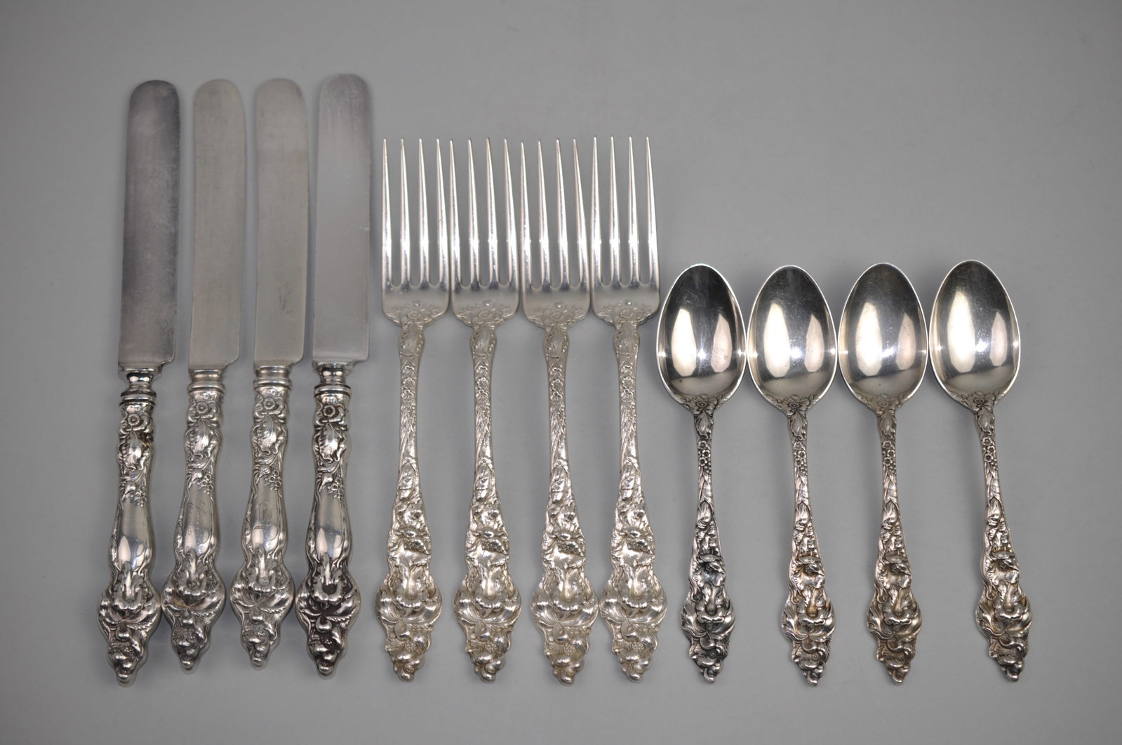 Reed Barton Les Six Fleurs Sterling Service Set: ?Metal: Sterling Silver Manufacturer:?Reed & Barton Dimensions: Various Weight:? Forks and Spoons 14.49 ozt, Knives 9.59 ozt Condition: