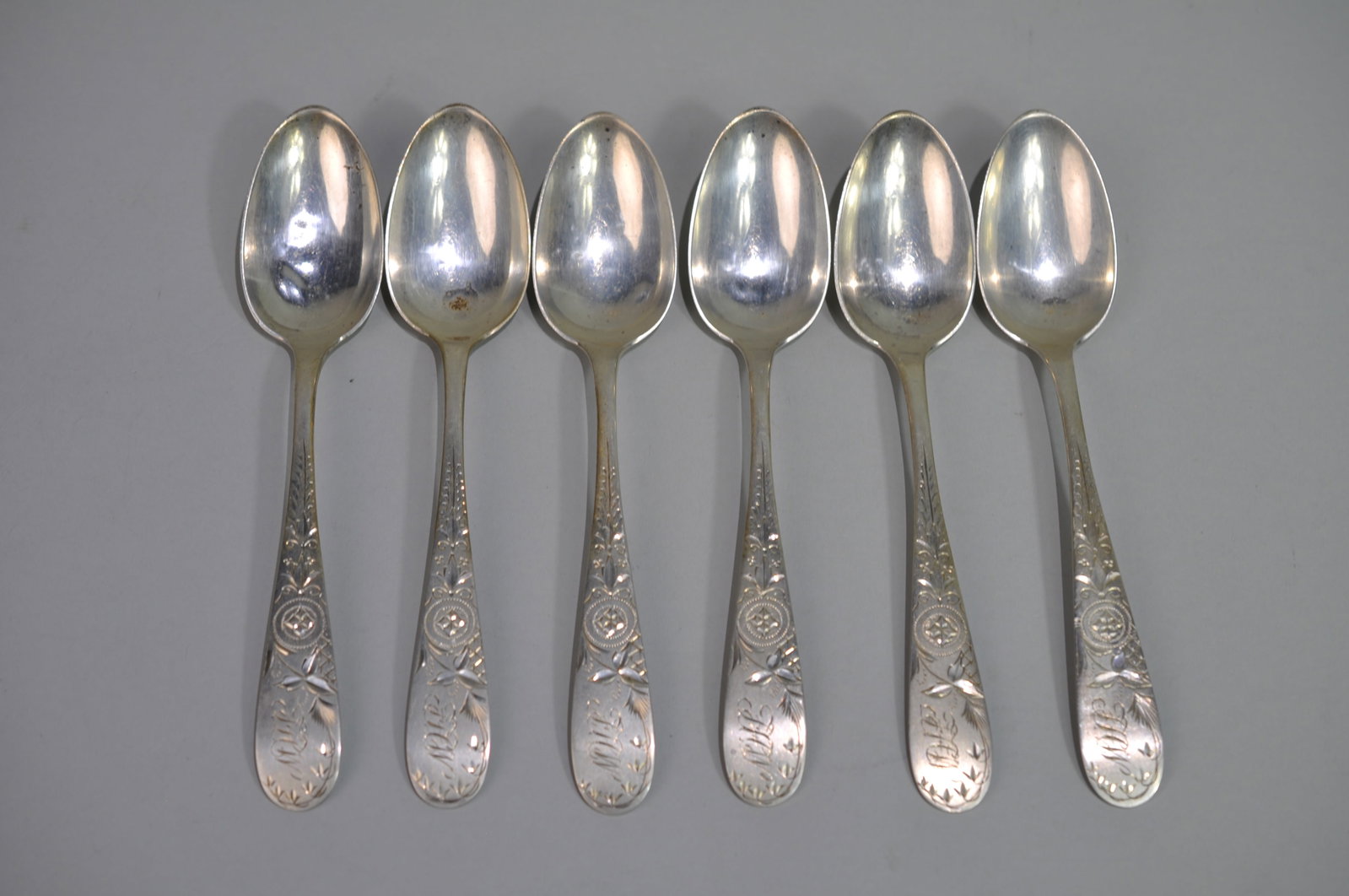 Sterling Silver Spoons Set: Metal: Sterling Silver Manufacturer:?No Makers Mark- Stamped Sterling Dimensions:?Approx. 7" Each