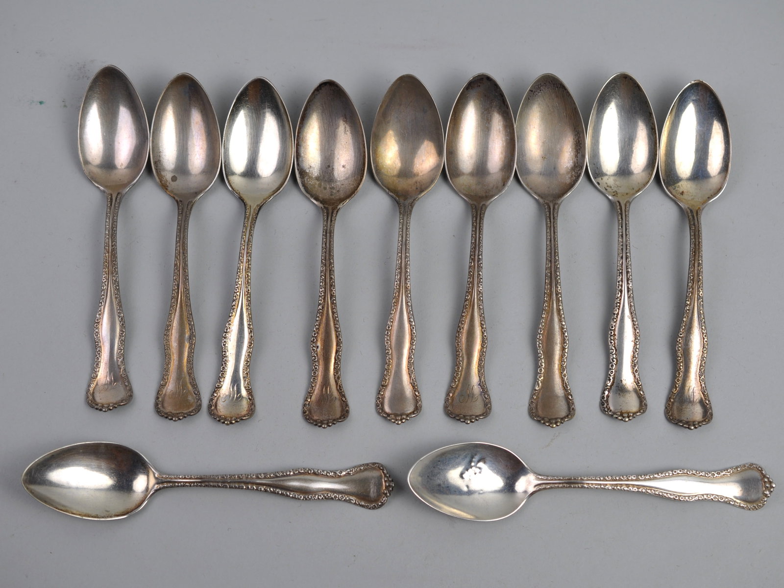 Sterling Silver Spoons: Metal: Sterling Silver Manufacturer:?Justins and George Walters? Dimensions:?Approx. 6" Each