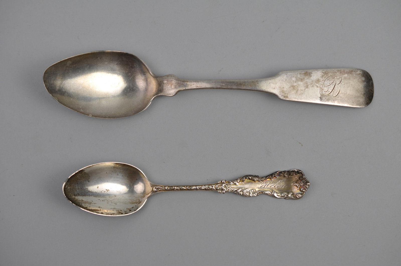 2 Silver Spoons: Metal:?Silver Dimensions:?Various Weight:?2.25 ozt Condition: Pat