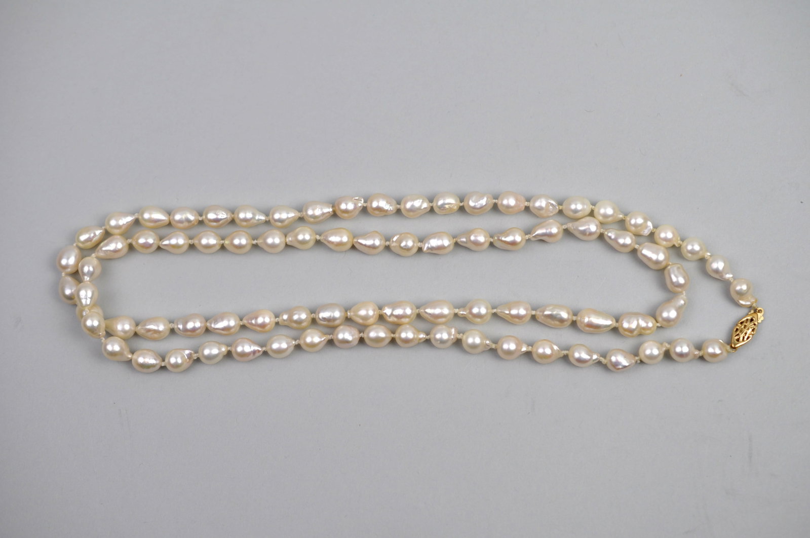 14K Gold Clasp Cultured Pearl Necklace: Metal:?14K Clasp Stone Types:?Cultured Baroque Pearls Dimensions:?Approx. 17" Clasped