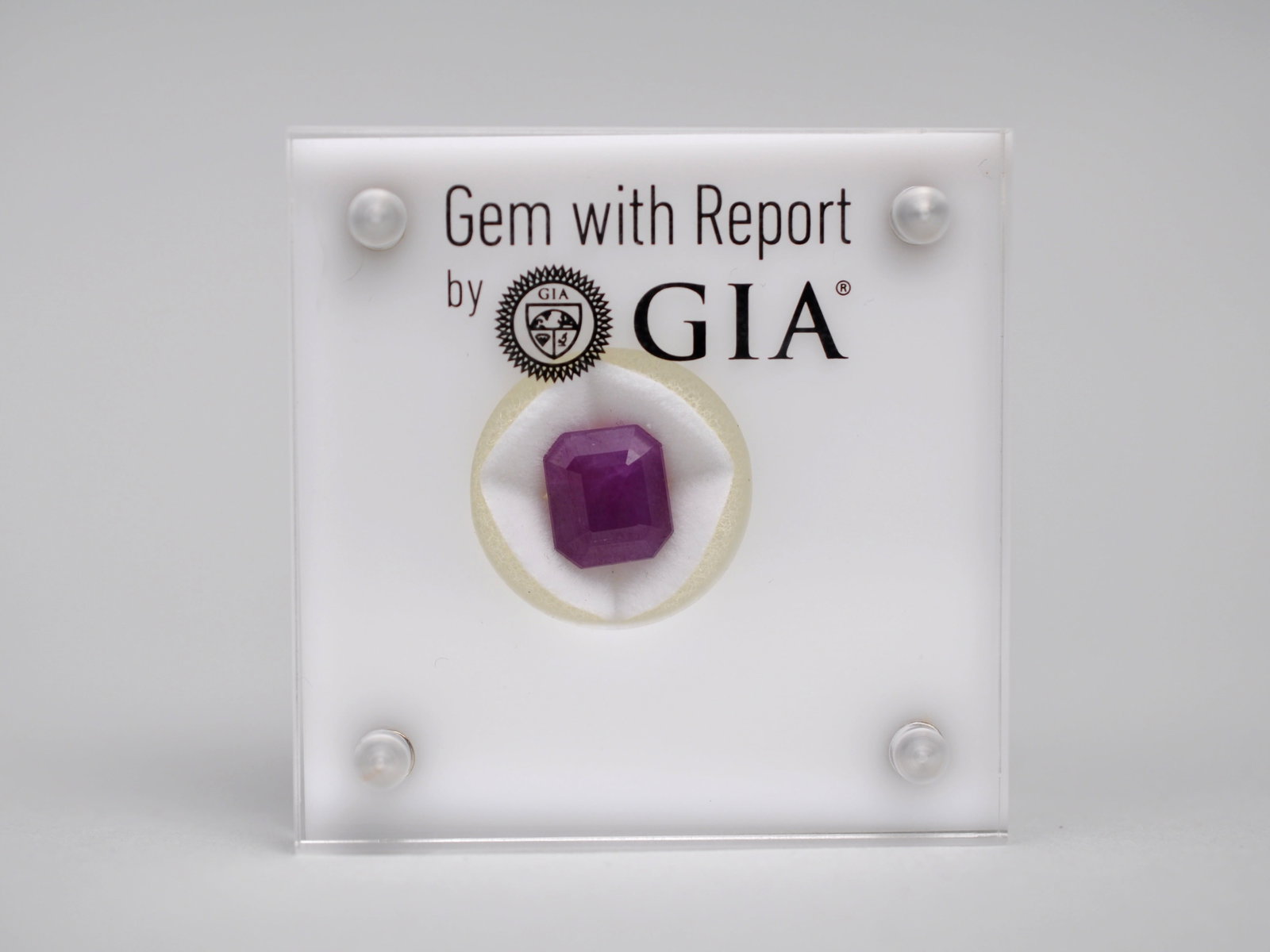 Natural Corundum Ruby: GIA Gemstone Certification Stats Dimensions:?9.88? 8.67 7.37 mm Weight: 6.67 carats Mohs Hardness:?9 Toughness:?Excellent Shape: Octagonal Color:?Purplish Red Transparency:?Translucent Cutting