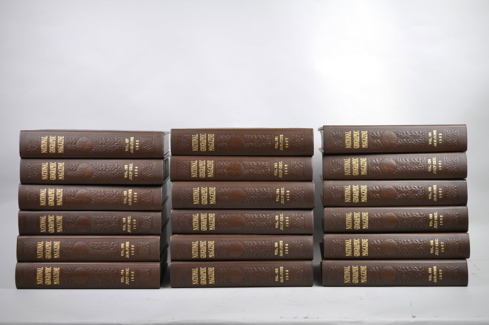 Vol. 119-136 National Geographic 1961-1969 Brown Leather Bound: Month Issued: January-December Year Issued:?1961-1969 Dimensions: 9 7/8x6 3/4x1- 2" each