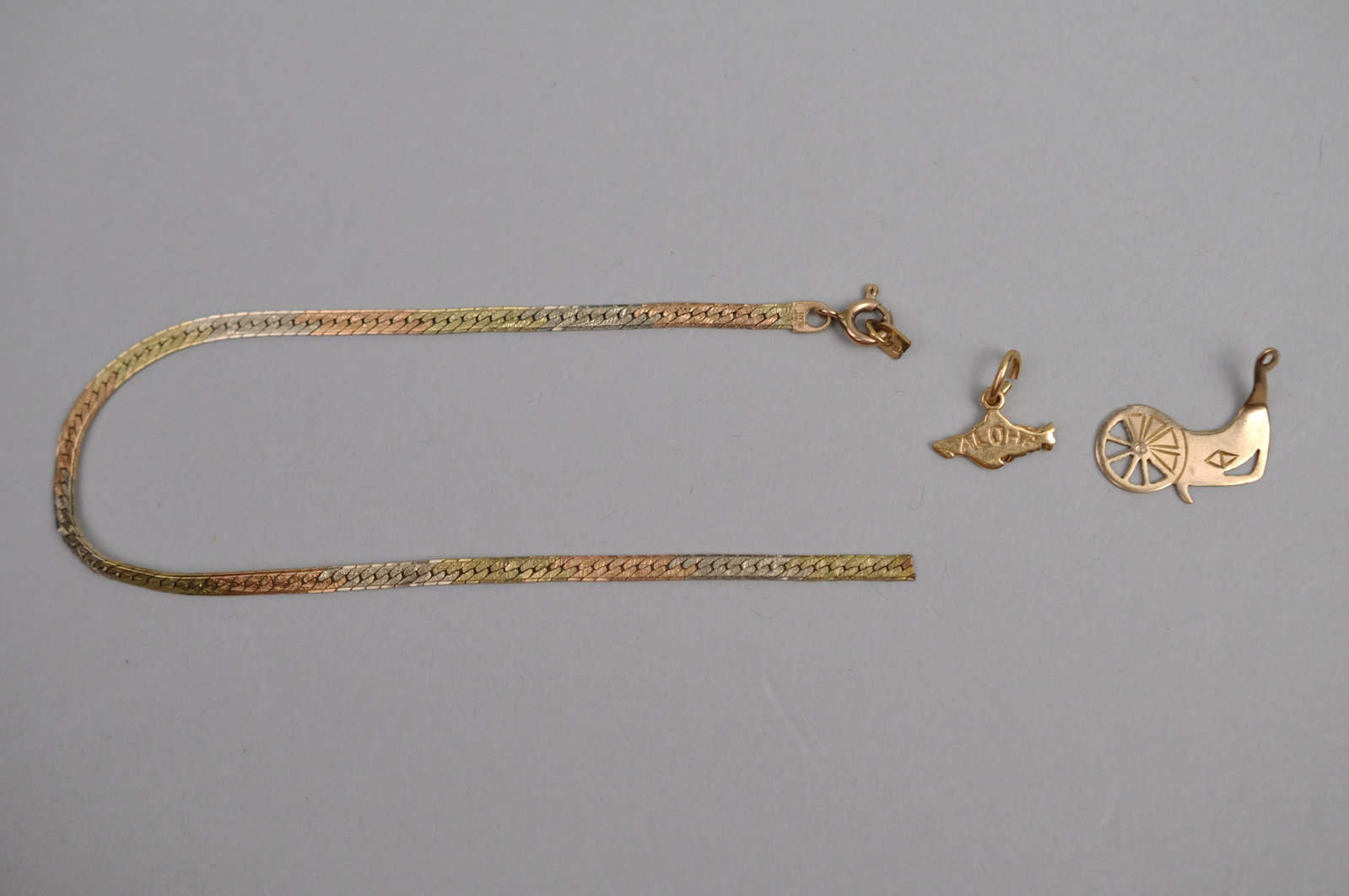 14K Gold Pins Chain Piece: Metal: 14K Yellow Gold Stone Types: None Dimensions: Various Weight: Approx. 0.07ozt Combined Condition: Chain Fragment Broken; Light Surface Wear Consistent with Age and Use Additional Information: