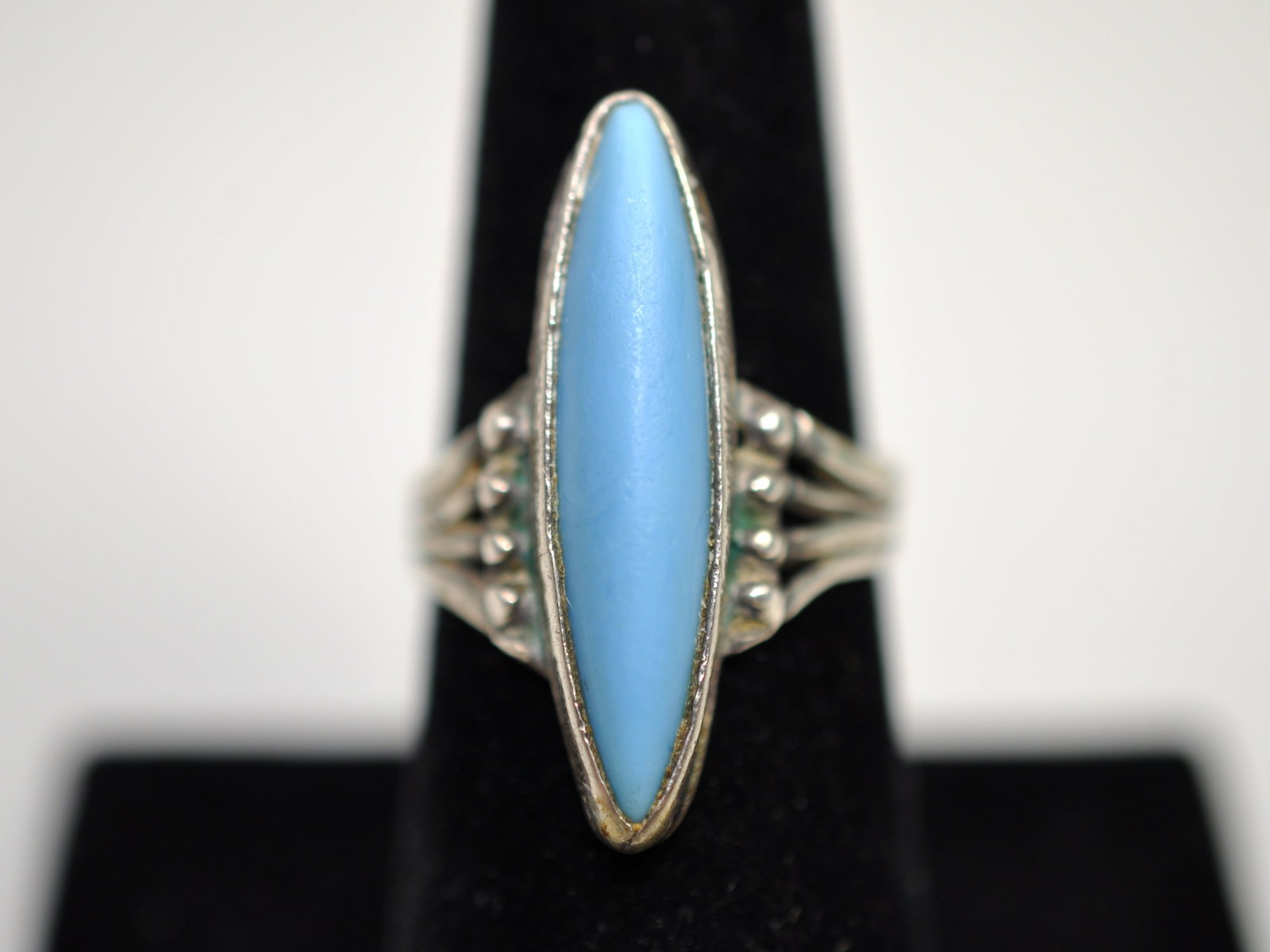 Silver Southwestern Turquoise Ring: Metal: Sterling silver, possibly Mexican silver with worn assay mark Stone Types: Turquoise Dimensions: Ring size 7.5 Weight: 0.19ozt Condition: