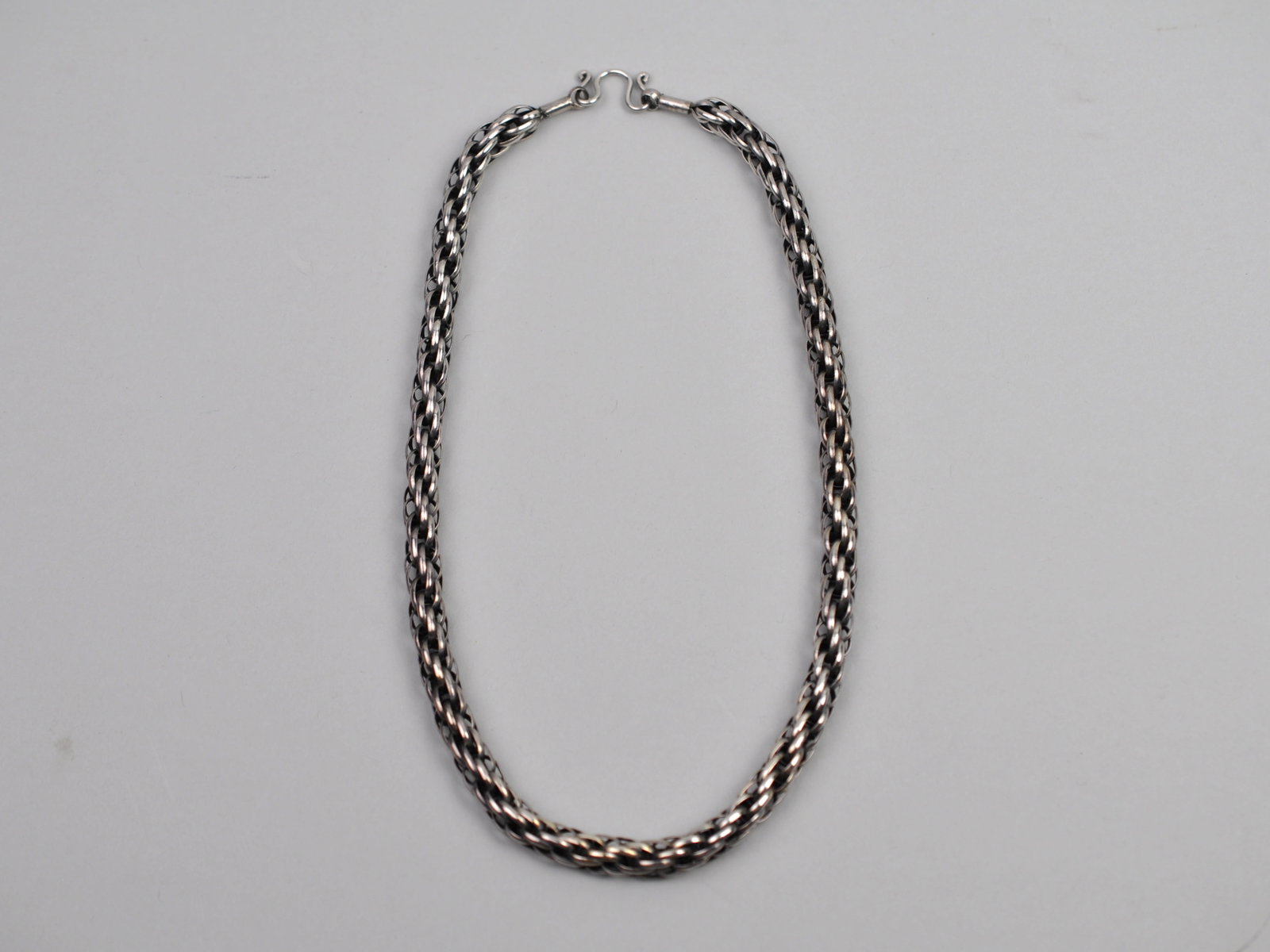 Silver Balinese Foxtail Necklace: Metal: Silver (tested) Stone Types: None Dimensions: 18 in. necklace length Weight: 1.57ozt Condition: Surface wear consistent with age and use. Additional Information: Hand-woven foxtail chain