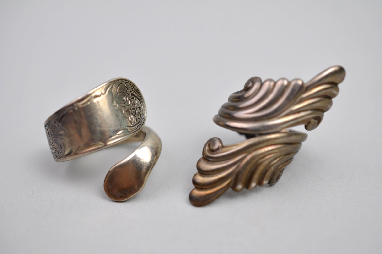 Sterling Silver Rings: Metal: Sterling silver Stone Types: None observed Dimensions: Ring sizes 4.5 and 5 Weight: 0.55ozt combined Condition: Surface wear consistent with age and use. Additional Information: Collection of