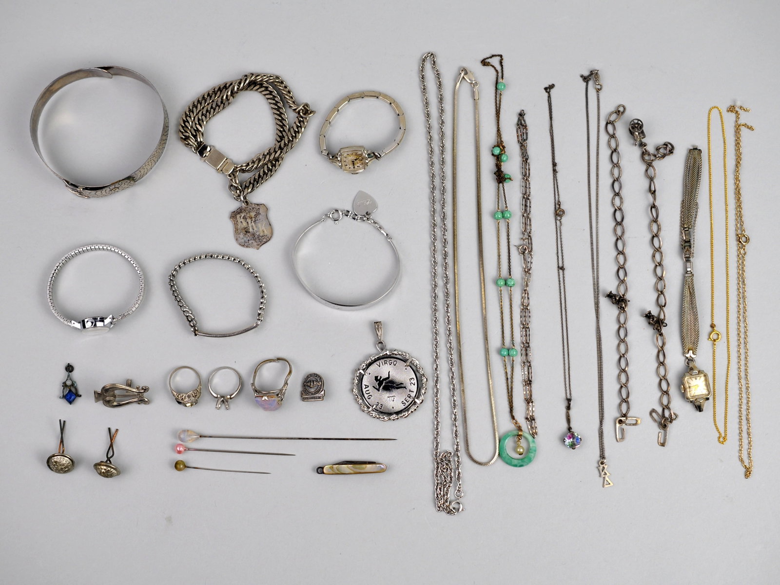 Silver-Tone Jewelry: Metal: Silver-Tone Metals Stone Types: None observed Dimensions: Assorted sizes Weight: 5.89ozt Condition: Mixed condition. Includes broken, incomplete, and salvage components. Surface wear