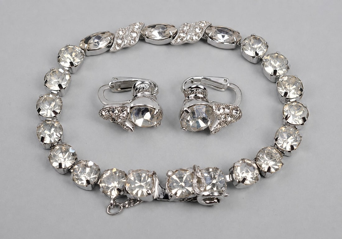 Eisenberg Ice Bracelet Earrings: Maker: Eisenberg Ice Type: Bracelet and clip-on earrings Dimensions: Bracelet approximately 8 in. L; earrings approximately 1 in. H Weight: 0.68ozt Condition: Surface wear consistent with age and