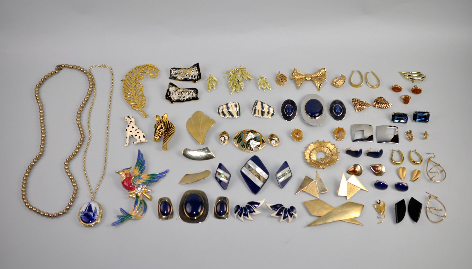 Costume Jewelry Animal Nature Decorative: Metal: Gold-tone and silver-tone costume jewelry metals Stone Types: Enamel, faux pearls, rhinestones, glass accents, cabochons, and mixed decorative elements<