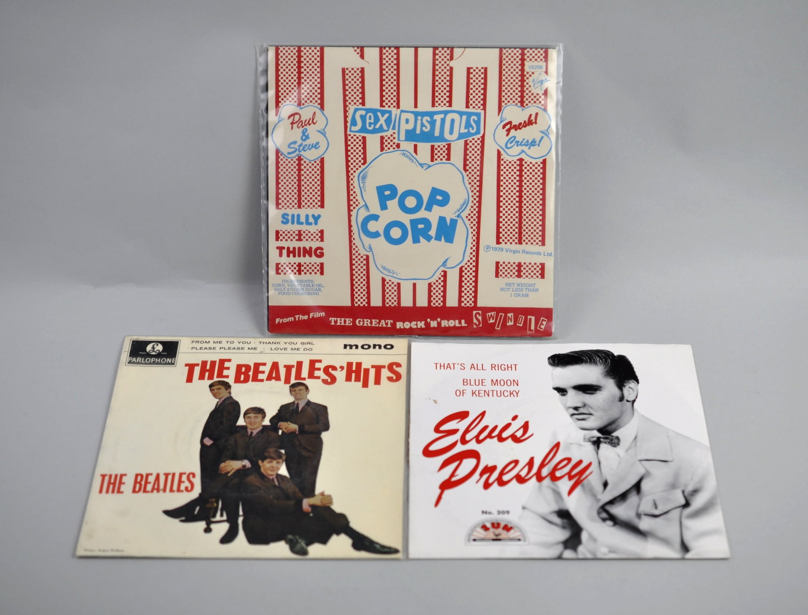 Sex Pistols, Beatles & Elvis Vintage Rock Records: Manufacturer: Virgin Records, Sun Records, Parlophone Dimension: Approx. 7 x 7 in. Condition: Signs of wear do t