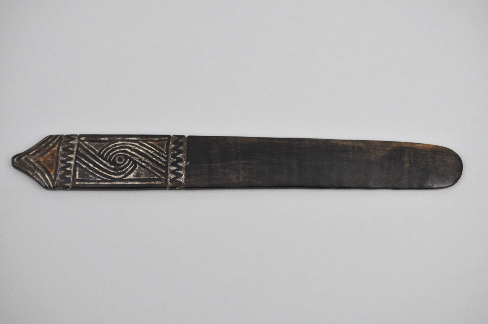 Massim Lime Spatula: Manufacturer: N/A- Handmade Dimensions: Approx. 7x 7/8x1/4 in. Condition: Markings Consistent with Lime/Fruit Use Additional Information: This vintage wooden Massim lime spatula is a finely crafted