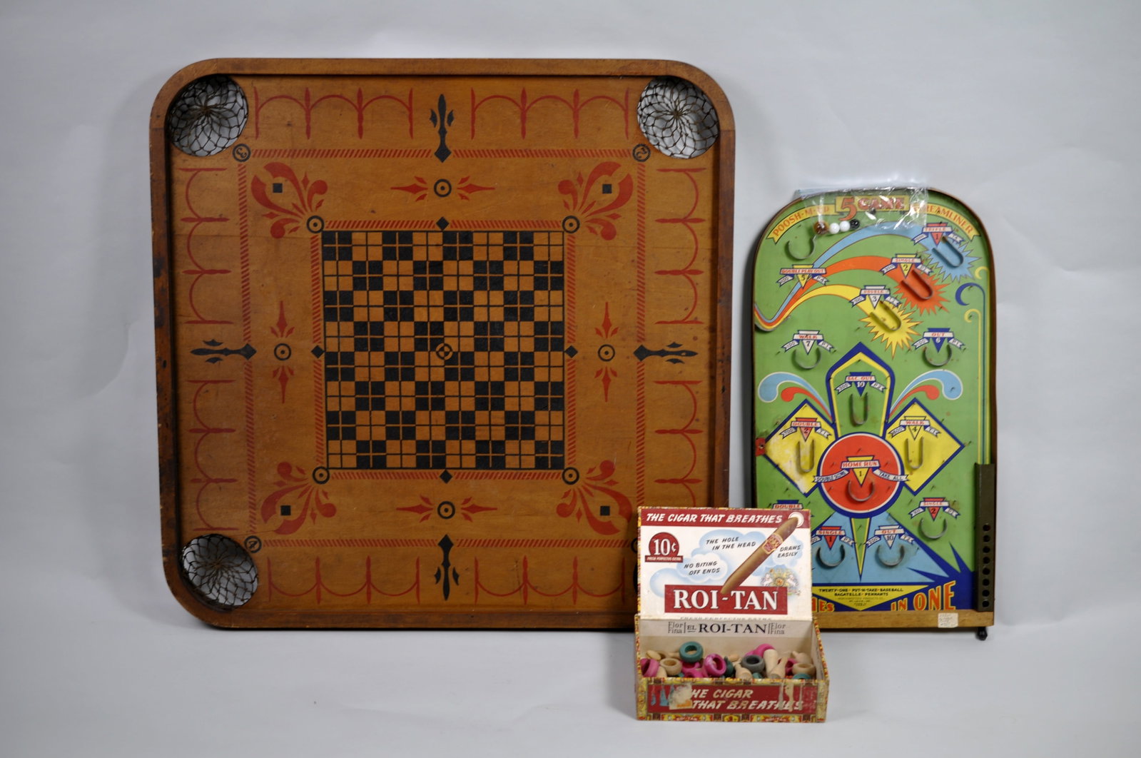 Wooden Tabletop Children's Games: Manufacturer: Various Dimensions: Various Condition: Various Additional Information: This vintage Carrom Co. game set offers a wonderful combination of classic family entertainment and nostalgic