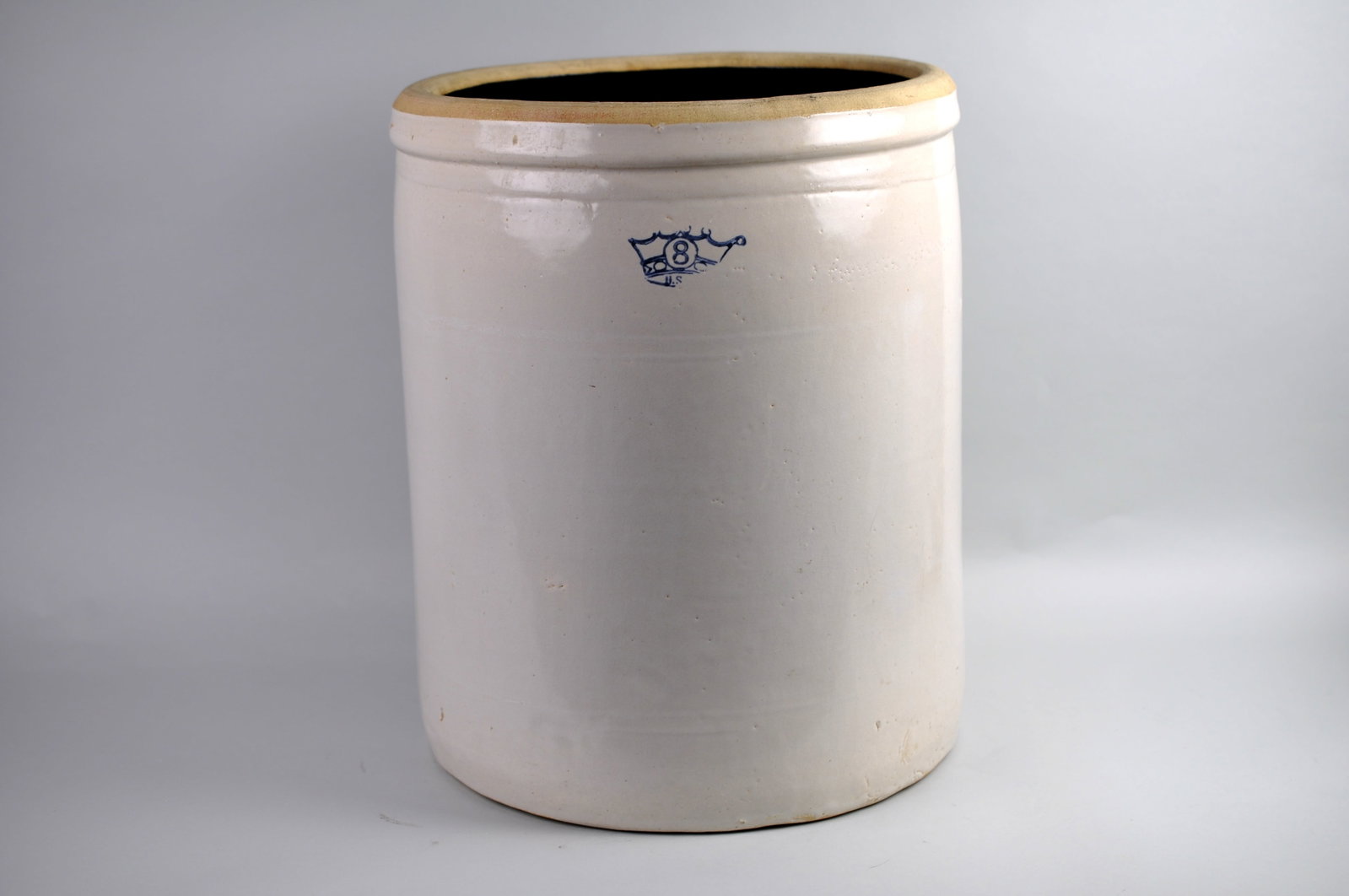 Robinson Ransbottom 8-gallon Stoneware Crock: Manufacturer: Robinson Ransbottom Pottery Co. Dimensions: Approx. 13 1/2x13 1/2x16 1/2 in. Condition: All Imperfections/Characteristics Seemed to have been Previous to the Heat Treatment Additional