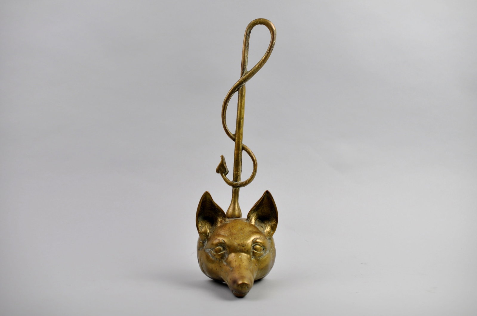 Brass Fox and Whip Doorstop: Dimensions: Approx. 4 1/2x5 1/2x15 1/2 in. Condition: Heavy Patina and Tarnish in the Crevices Additional Information: This Virginia Metalcrafters-style brass fox and whip doorstop is a handsome