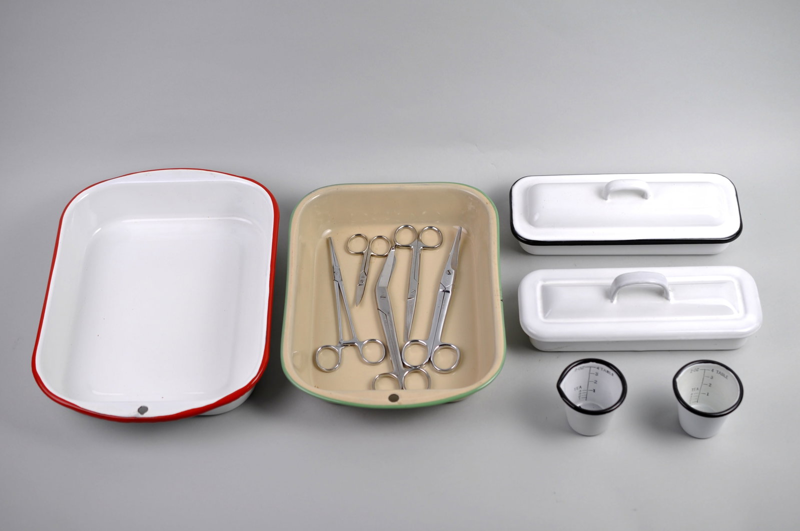 Farmhouse/Hospital Vintage White Enamelware: Manufacturer: Various Dimensions: Various Condition: Light Scratches Present from Use Additional Information: This charming collection of vintage enamelware includes two white enamel