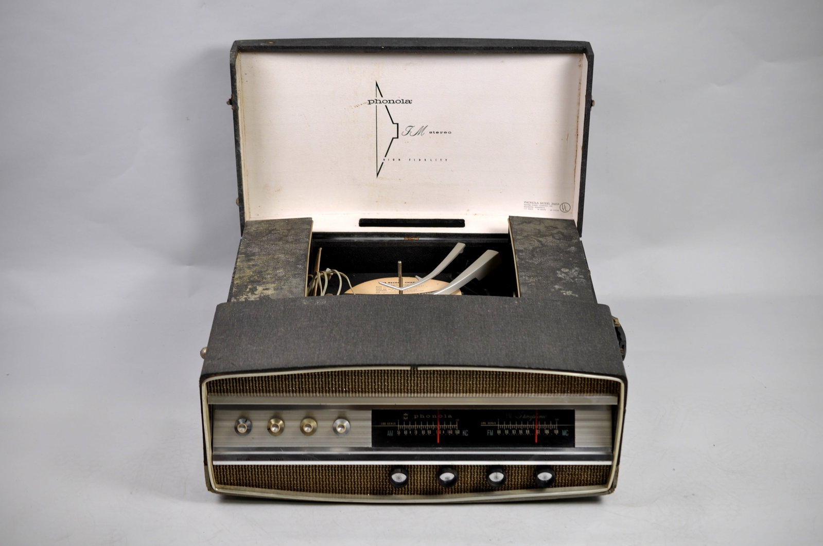 Phonola Portable Record Player: Manufacturer: Waters Conley Dimensions: Approx. 25 1/2x23x10 1/4 in. Condition: Dust/Dirty, Minor Scratches to E