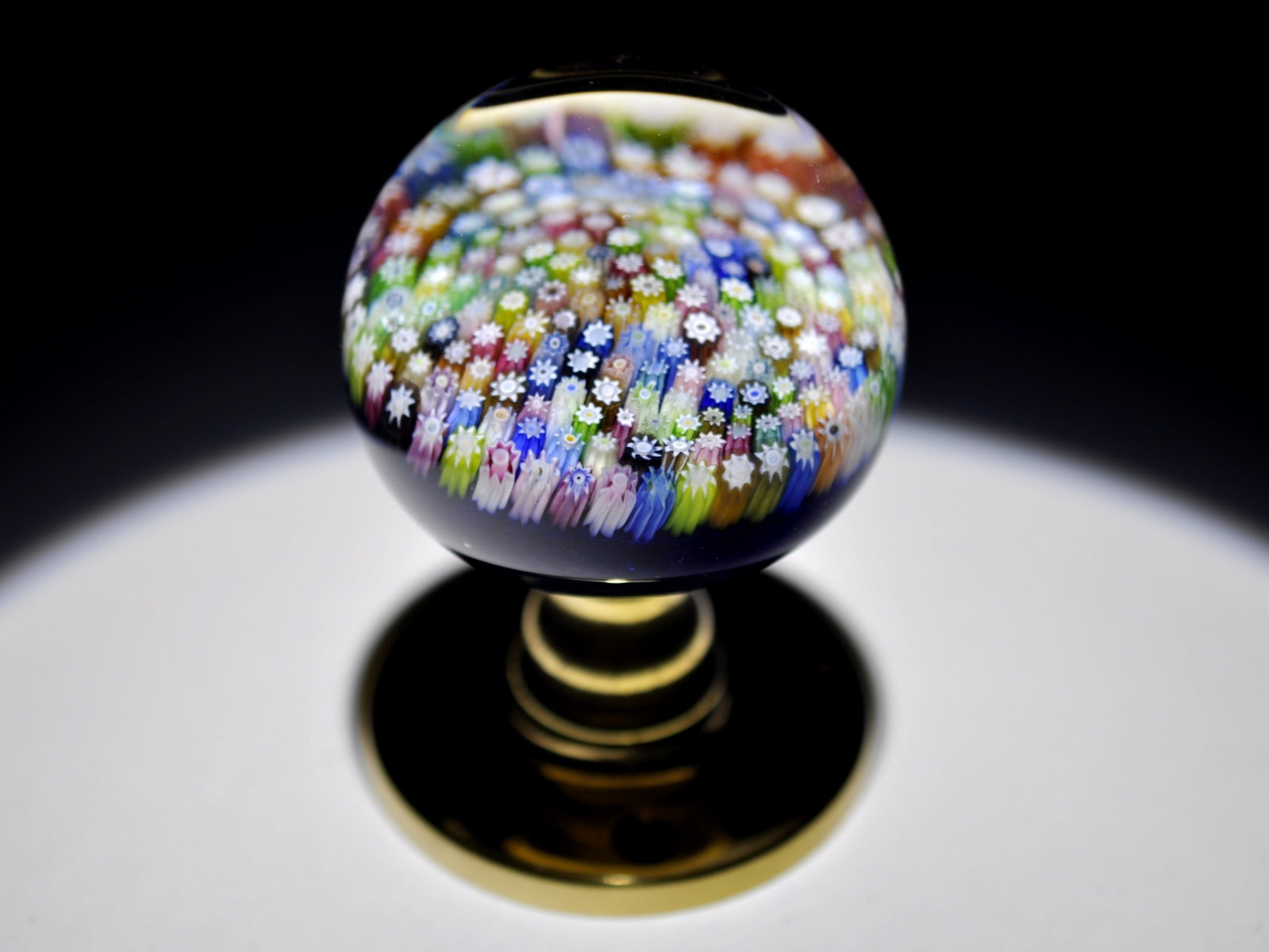 Millefiori Art Glass Doorknob: Attributed Brand: Perthshire, Crieff Scotland Period: 1987 Style: Millefiori, Ground, Doorknob Base: Brass Diameter: 2.03 in. Weight: 0.84 lb Condition: No obvious flaws. Additional Information: A