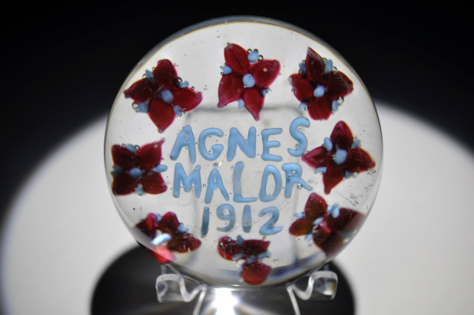 Union Glass Co. 1912 Custom Paperweight: Attributed Brand: Union Glass Co. Period: 1912 Style: Motif, Lampwork Base: Clear Diameter: 3.55 in. Weight: 2.13 lb Condition: Base wear and several dome scratches. Additional Description: A central