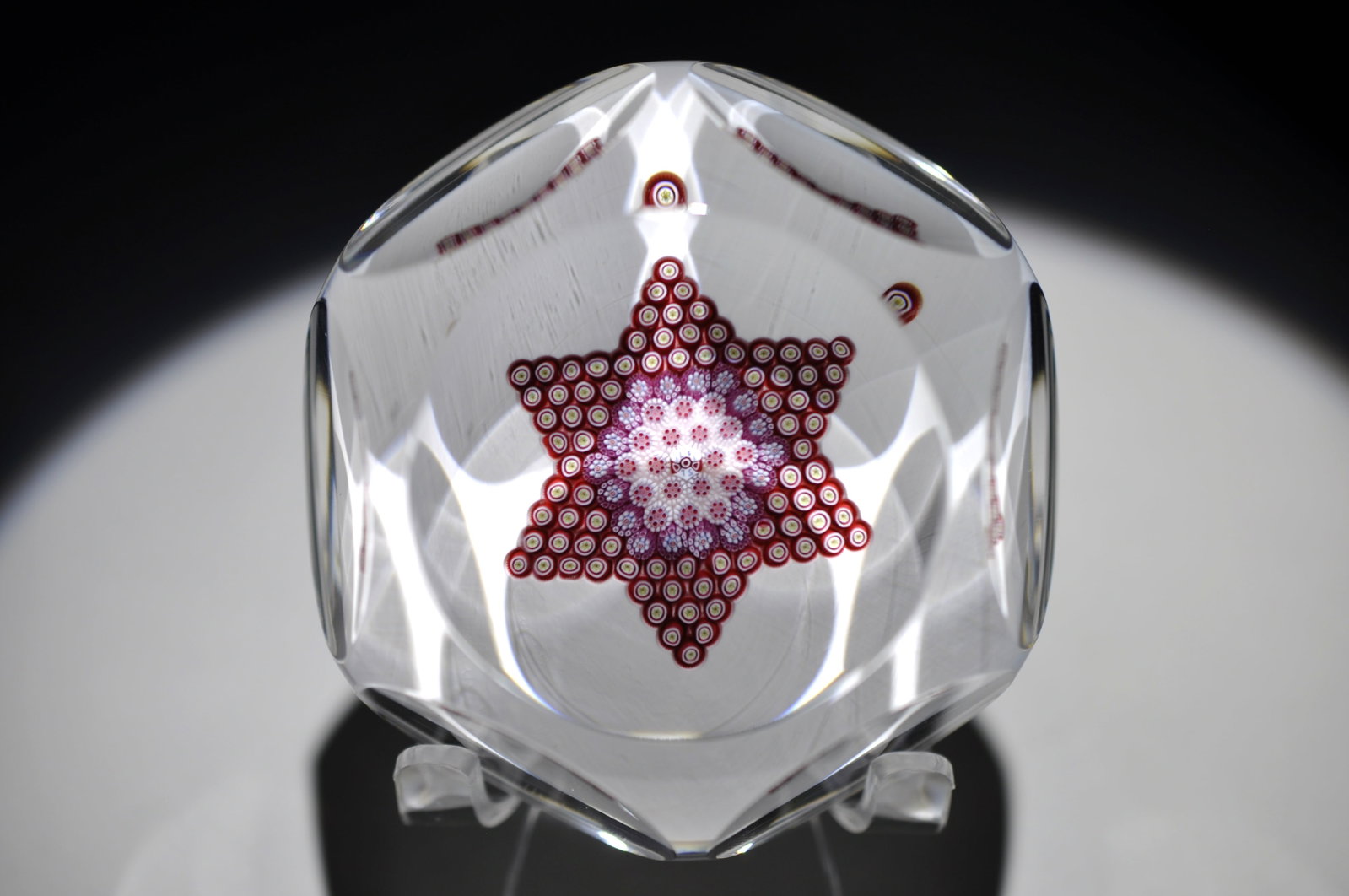1971 St. Louis Millefiori Star: Attributed Brand: Cristal de France, St. Louis Period: 1971 Style: Millefiori Base: Clear Diameter: 3.25 in. Weight: 1.24lb Condition: No Obvious Flaws Additional Information: A central signature