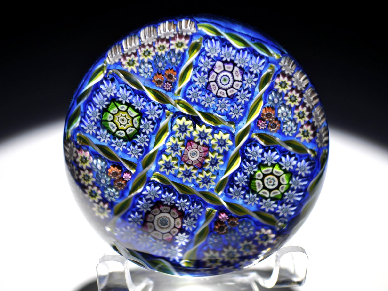 Perthshire 1979 Chequerboard Millefiori: Attributed Brand: Perthshire, Crieff Scotland Period: 1979 Style: Signature Cane, Millefiori, Latticinio, Garland, Ground Base: Clear Diameter: 2.98 in. Weight: 1.04 lb Condition: No obvious flaws.
