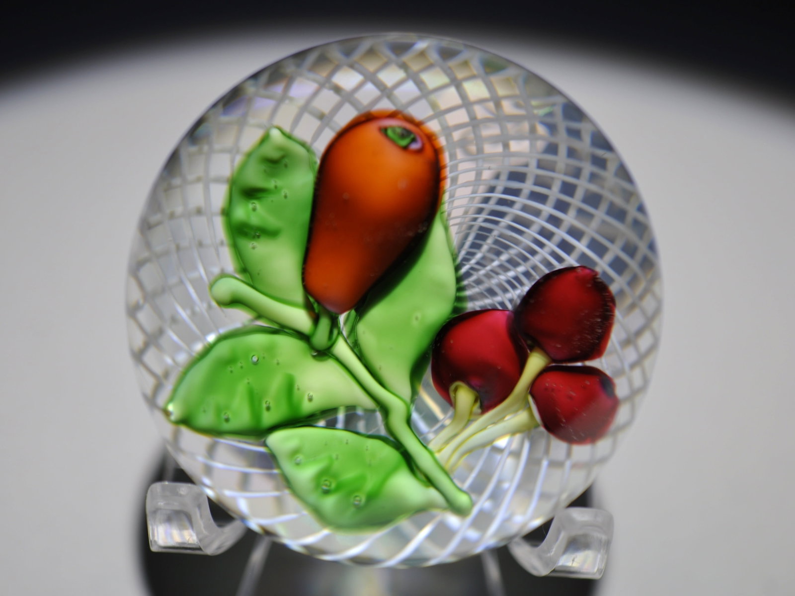 St. Louis Lampwork Fruit Latticinio Weight: Attributed Brand: Cristal de France, St. Louis Period: 1980 Style: Motif, Ground, Latticinio, Signature Cane Base: Clear Diameter: 1.92 in. Weight: 0.32 lb Condition: No obvious flaws Additional