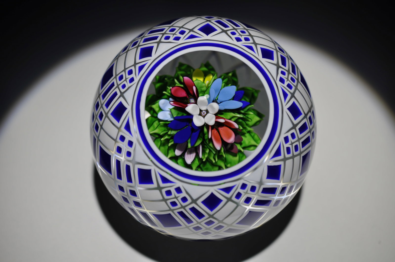 St. Louis 14/50 Gingham Weight: Attributed Brand: Cristal de France, St. Louis Period: 1990 Style: Lampwork, Gingham Base: Clear Diameter: 3.81 in. Weight: 2.91lb Condition: No Visible Flaws Additional Information: St. Louis France