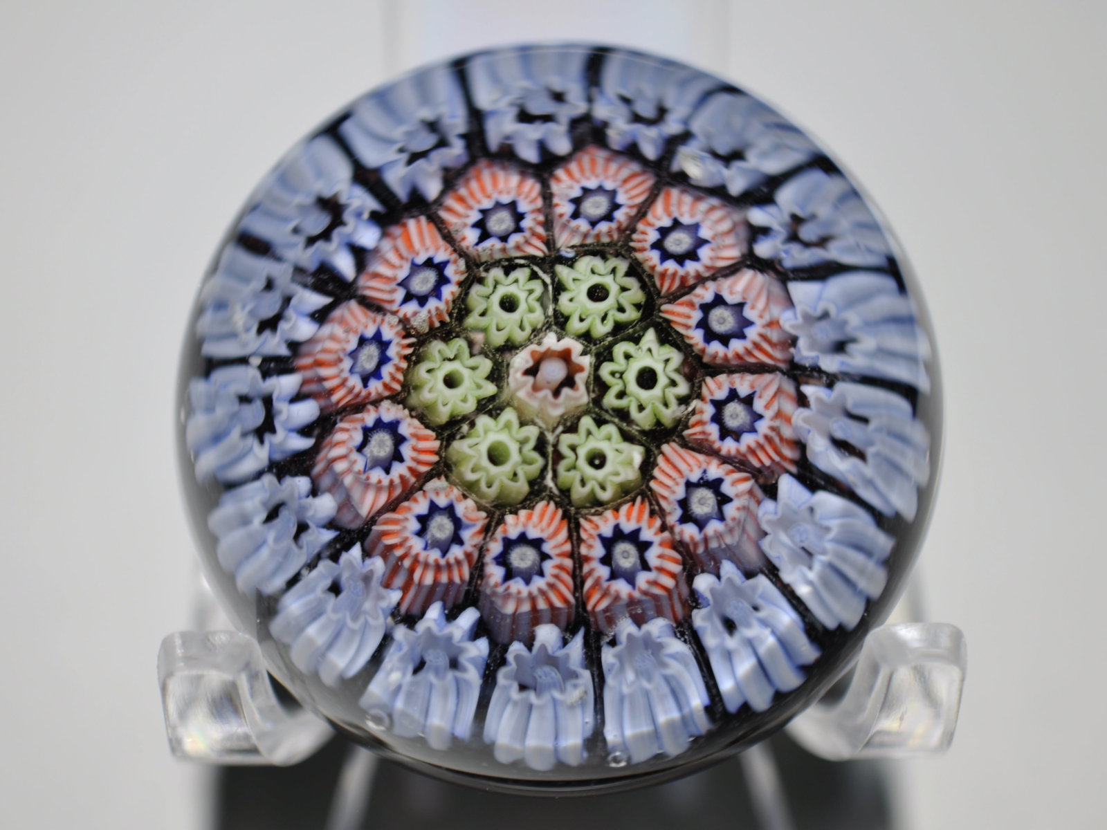 Miniature Millefiori Paperweight: Attributed Brand: Unattributed Period: Believed 19th century Style: Millefiori Base: Clear, fire polished pontil Diameter: 1.69 in. Weight: 0.17 lb Condition: Chip to Base Additional Information: A